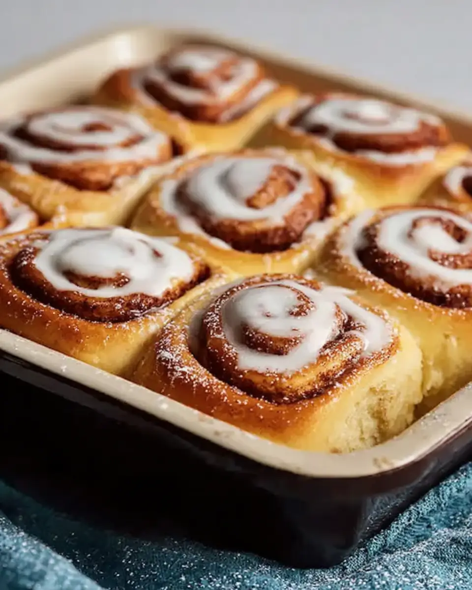 A delicious plate of The Best Cinnamon Rolls EVER (Soft, Fluffy & Homemade)